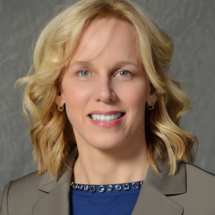 smiling woman with blonde hair