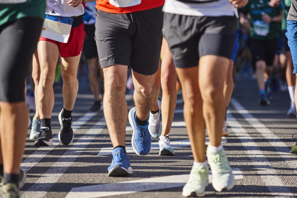 Runners on the street. Healthy lifestyle. Motion exercise. Athletics