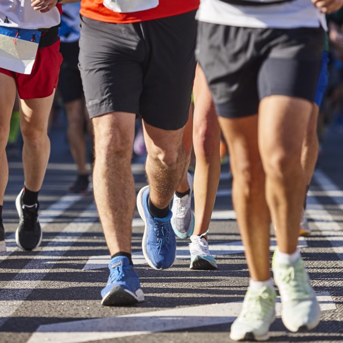 Runners on the street. Healthy lifestyle. Motion exercise. Athletics