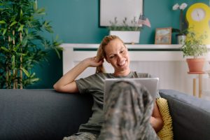 Military woman on tablet
