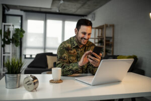 Army man with smart phone