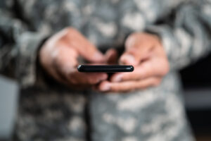 us soldier on smartphone
